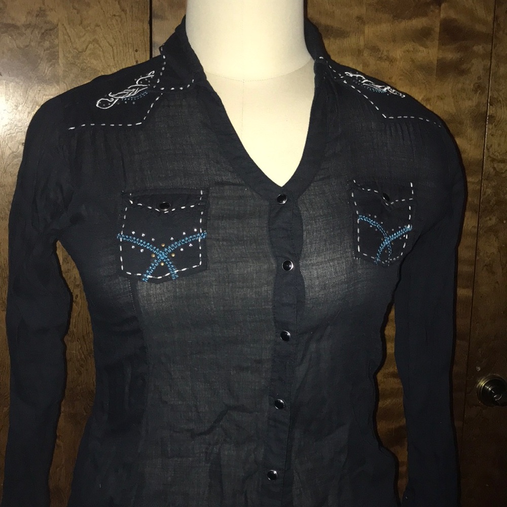 Western Blouse full of detail. Only worn once.